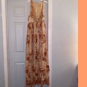 I purchased this GORGEOUS dress from a Boutique called Southern Fried Chics